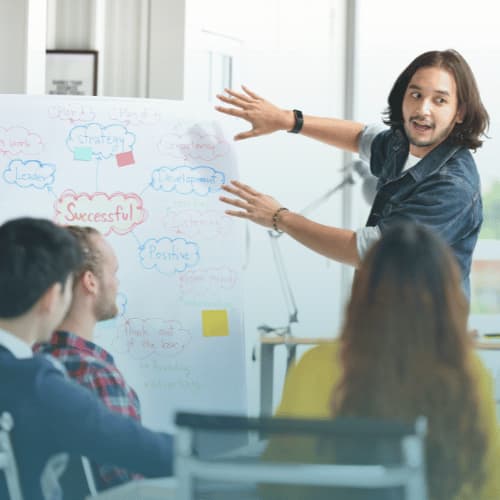man presenting to audience